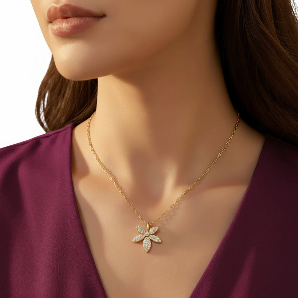 Floral gold-tone artificial pendant necklace with sparkling stones by Evah Jewels