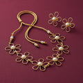 gold-tone floral necklace and matching flower stud earrings set for women, featuring open-petal daisy designs, white pearl centres and an adjustable cord by Evah Jewels.