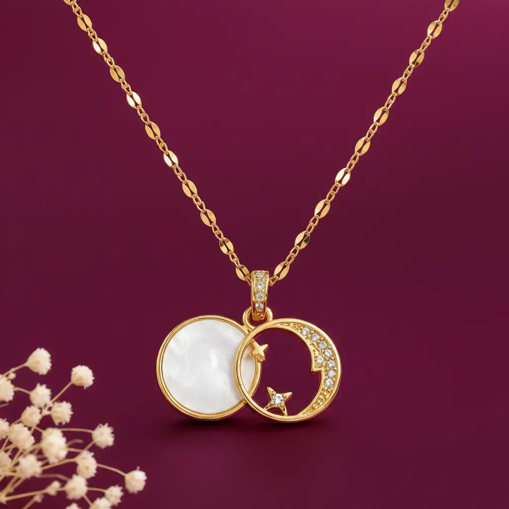 Gold-tone imitation jewellery necklace with a circular white pendant and sparkling star details by Evah Jewels