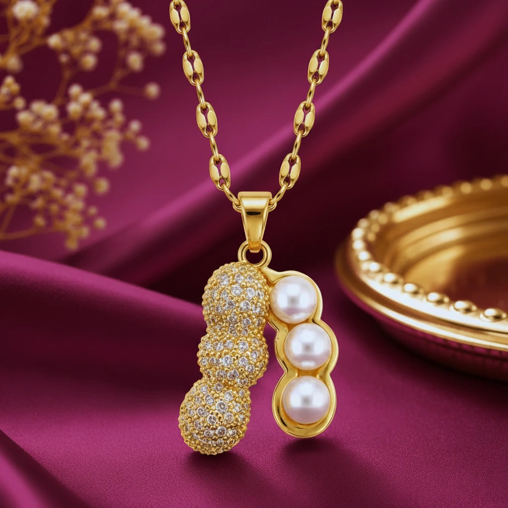 Gold-tone artificial jewellery necklace with a pearl and crystal-studded pendant by Evah Jewels