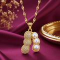 Gold-tone artificial jewellery necklace with a pearl and crystal-studded pendant by Evah Jewels