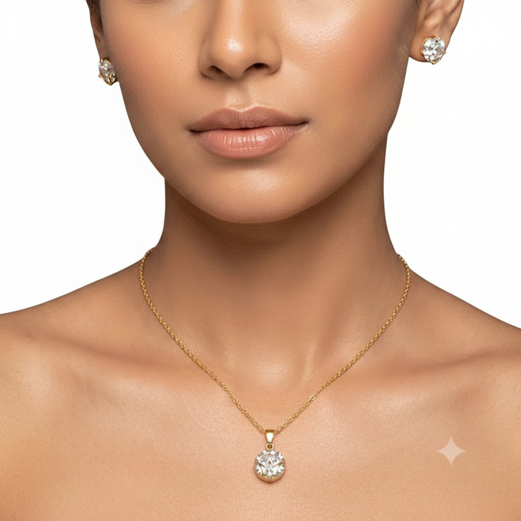 EVAH JEWELS gold-tone round crystal pendant necklace and matching sparkling stud earrings worn by a woman, showcasing an elegant jewellery set for women.